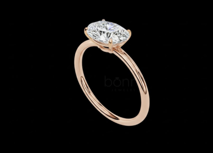 Oval-Cut D Color VVS Moissanite Solitaire Ring in Gold or Sterling Silver